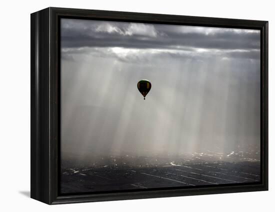A Lone Balloon Drifts Near the Foothills of Albuquerque, N.M.-null-Framed Premier Image Canvas