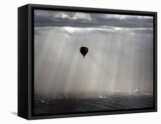 A Lone Balloon Drifts Near the Foothills of Albuquerque, N.M.-null-Framed Premier Image Canvas