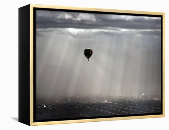 A Lone Balloon Drifts Near the Foothills of Albuquerque, N.M.-null-Framed Premier Image Canvas