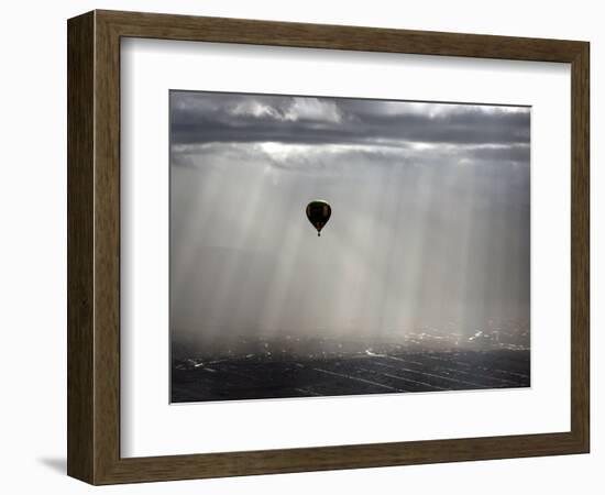 A Lone Balloon Drifts Near the Foothills of Albuquerque, N.M.-null-Framed Photographic Print