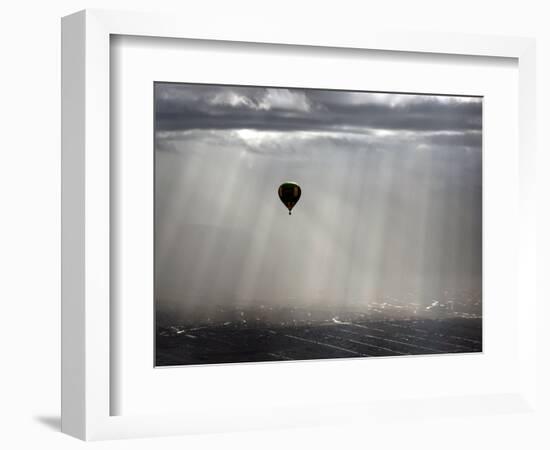 A Lone Balloon Drifts Near the Foothills of Albuquerque, N.M.-null-Framed Photographic Print