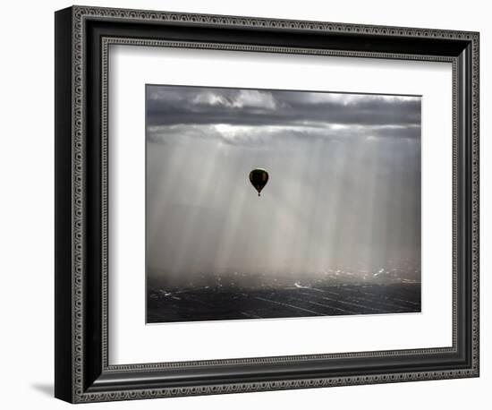 A Lone Balloon Drifts Near the Foothills of Albuquerque, N.M.-null-Framed Photographic Print