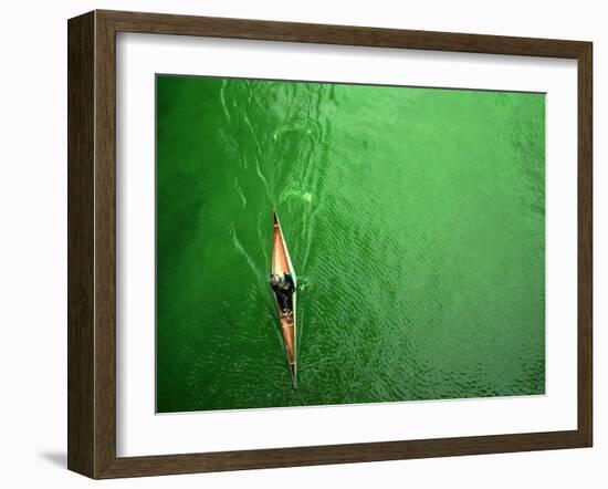 A Lone Kayaker Travels Down the Chicago River after It was Painted Green-null-Framed Photographic Print