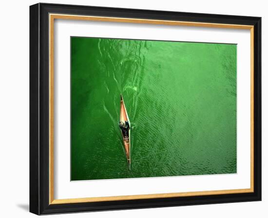 A Lone Kayaker Travels Down the Chicago River after It was Painted Green-null-Framed Photographic Print