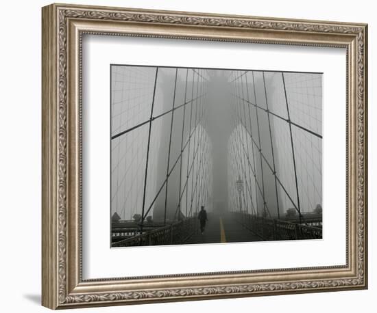 A Lone Runner Makes His Way Across the Fog-Shrouded Brooklyn Bridge Christmas Morning-null-Framed Photographic Print