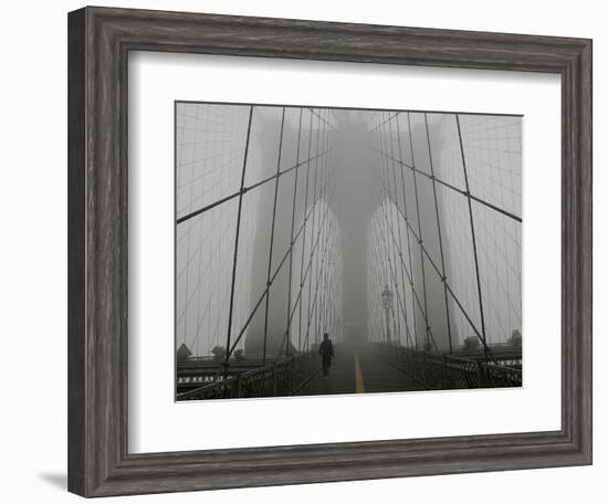 A Lone Runner Makes His Way Across the Fog-Shrouded Brooklyn Bridge Christmas Morning-null-Framed Photographic Print