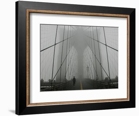 A Lone Runner Makes His Way Across the Fog-Shrouded Brooklyn Bridge Christmas Morning-null-Framed Photographic Print