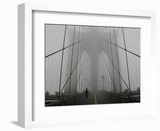 A Lone Runner Makes His Way Across the Fog-Shrouded Brooklyn Bridge Christmas Morning-null-Framed Photographic Print