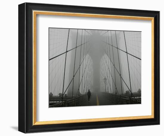 A Lone Runner Makes His Way Across the Fog-Shrouded Brooklyn Bridge Christmas Morning-null-Framed Photographic Print