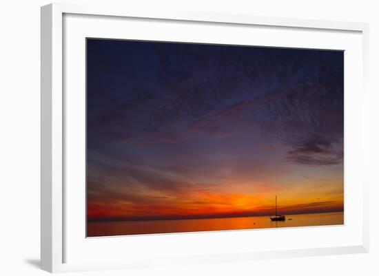 A Lone Sailboat Sits on the Calm Waters of the Chesapeake Bay Off Tilghman Island, Maryland-Karine Aigner-Framed Photographic Print