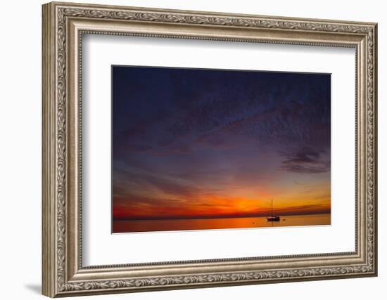 A Lone Sailboat Sits on the Calm Waters of the Chesapeake Bay Off Tilghman Island, Maryland-Karine Aigner-Framed Photographic Print