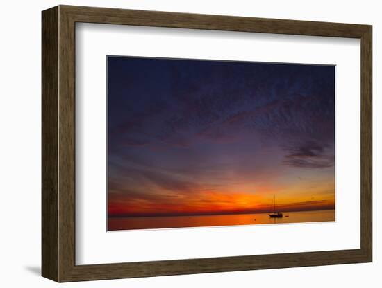 A Lone Sailboat Sits on the Calm Waters of the Chesapeake Bay Off Tilghman Island, Maryland-Karine Aigner-Framed Photographic Print