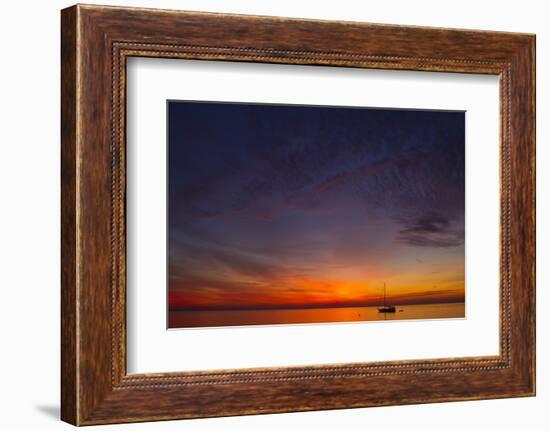 A Lone Sailboat Sits on the Calm Waters of the Chesapeake Bay Off Tilghman Island, Maryland-Karine Aigner-Framed Photographic Print