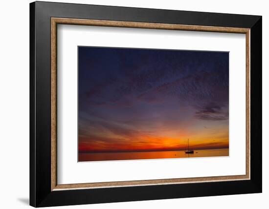 A Lone Sailboat Sits on the Calm Waters of the Chesapeake Bay Off Tilghman Island, Maryland-Karine Aigner-Framed Photographic Print