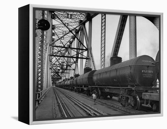 A Long String of Tank Cras Heading across the Huey Long Bridge-null-Framed Premier Image Canvas