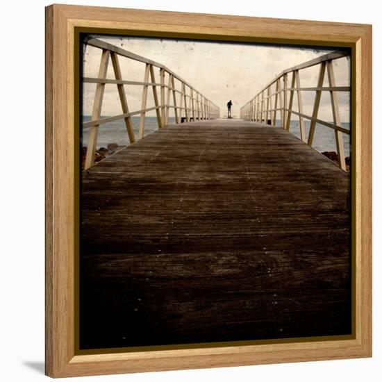 A Long Wooden Walkway at the Sea with a Figure Standing in the Distance-Luis Beltran-Framed Premier Image Canvas