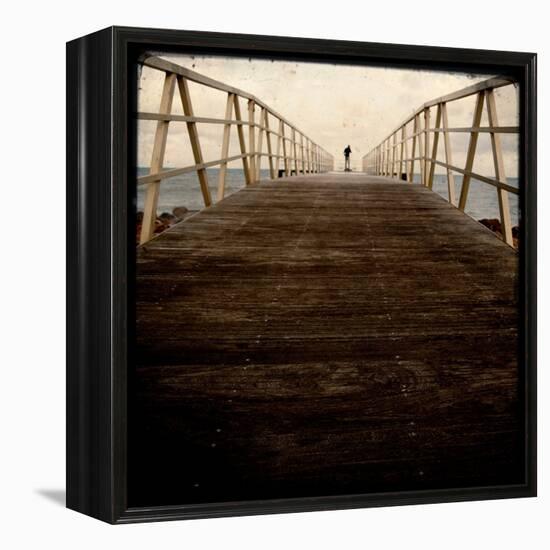 A Long Wooden Walkway at the Sea with a Figure Standing in the Distance-Luis Beltran-Framed Premier Image Canvas