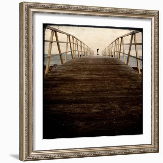 A Long Wooden Walkway at the Sea with a Figure Standing in the Distance-Luis Beltran-Framed Photographic Print