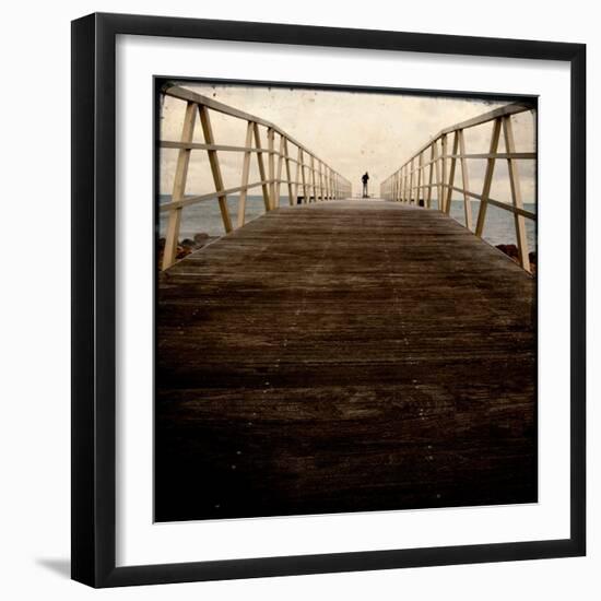 A Long Wooden Walkway at the Sea with a Figure Standing in the Distance-Luis Beltran-Framed Photographic Print