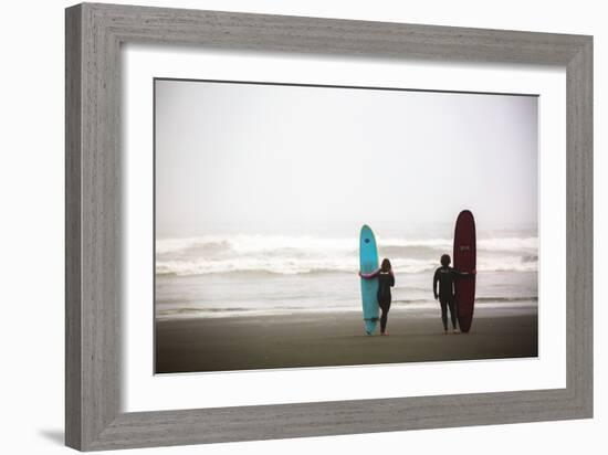 A Male And Female Surfer Hold Their Surfboards In The Olympic National Park In Washington State-Ben Herndon-Framed Photographic Print