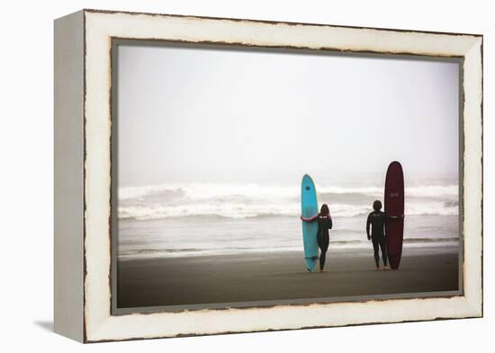 A Male And Female Surfer Hold Their Surfboards In The Olympic National Park In Washington State-Ben Herndon-Framed Premier Image Canvas