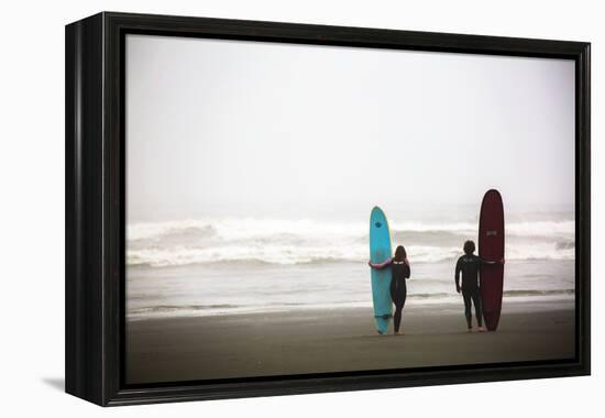 A Male And Female Surfer Hold Their Surfboards In The Olympic National Park In Washington State-Ben Herndon-Framed Premier Image Canvas