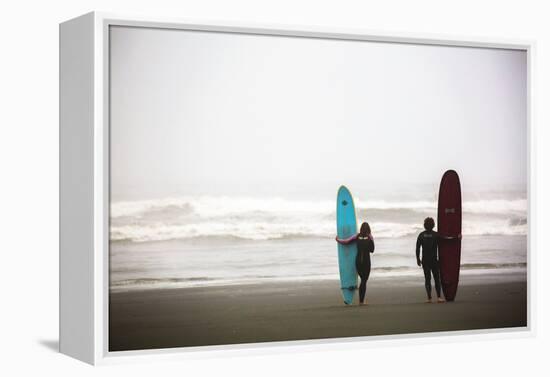 A Male And Female Surfer Hold Their Surfboards In The Olympic National Park In Washington State-Ben Herndon-Framed Premier Image Canvas