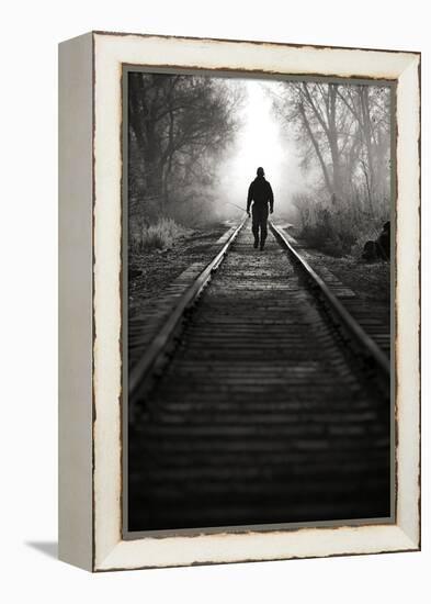 A Male Angler Walks Down Train Tracks Near the Middle Provo River in Winter in Utah-Adam Barker-Framed Premier Image Canvas