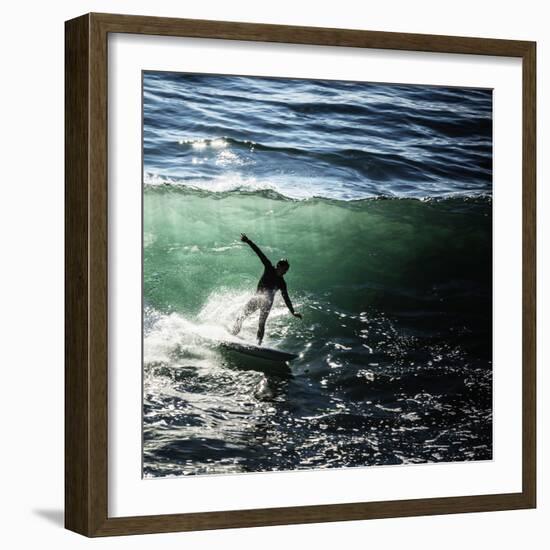 A Male Surfer Rides An Emerald Colored Wave In The Pacific Ocean Off The Coast Of Santa Cruz-Ron Koeberer-Framed Photographic Print