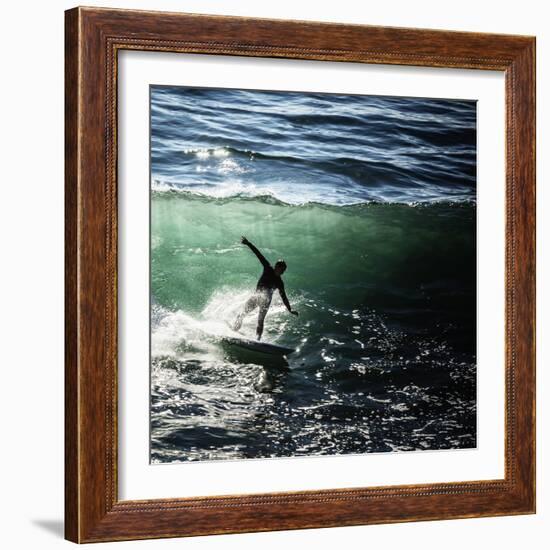 A Male Surfer Rides An Emerald Colored Wave In The Pacific Ocean Off The Coast Of Santa Cruz-Ron Koeberer-Framed Photographic Print