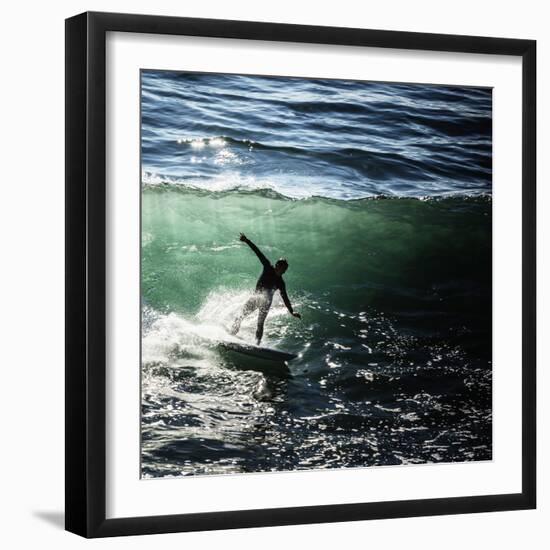 A Male Surfer Rides An Emerald Colored Wave In The Pacific Ocean Off The Coast Of Santa Cruz-Ron Koeberer-Framed Photographic Print