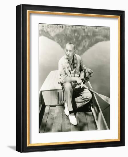 A Man and His Dachshund Go Rowing-null-Framed Photo