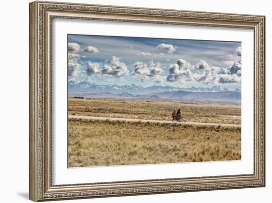 A Man Cycles with a Family Member on the Back of His Bicycle Between La Paz and Tiwanaku-Alex Saberi-Framed Photographic Print