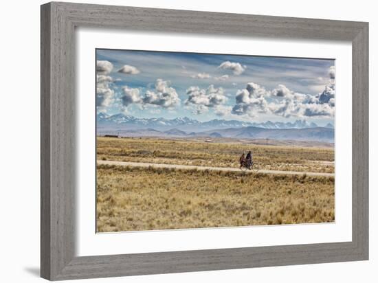 A Man Cycles with a Family Member on the Back of His Bicycle Between La Paz and Tiwanaku-Alex Saberi-Framed Photographic Print