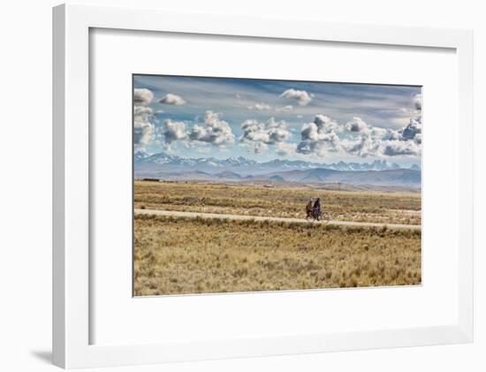 A Man Cycles with a Family Member on the Back of His Bicycle Between La Paz and Tiwanaku-Alex Saberi-Framed Photographic Print