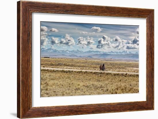 A Man Cycles with a Family Member on the Back of His Bicycle Between La Paz and Tiwanaku-Alex Saberi-Framed Photographic Print