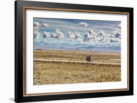 A Man Cycles with a Family Member on the Back of His Bicycle Between La Paz and Tiwanaku-Alex Saberi-Framed Photographic Print