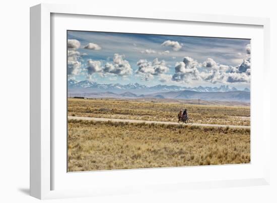 A Man Cycles with a Family Member on the Back of His Bicycle Between La Paz and Tiwanaku-Alex Saberi-Framed Photographic Print