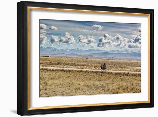 A Man Cycles with a Family Member on the Back of His Bicycle Between La Paz and Tiwanaku-Alex Saberi-Framed Photographic Print