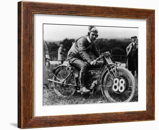 A Man Dressed in Leathers on a Harley-Davidson-null-Framed Photographic Print