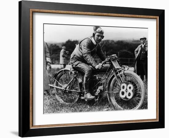 A Man Dressed in Leathers on a Harley-Davidson-null-Framed Photographic Print