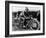 A Man Dressed in Leathers on a Harley-Davidson-null-Framed Photographic Print