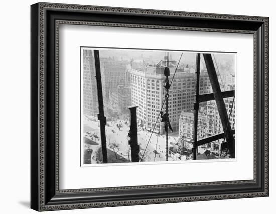 A Man Hangs Precariously from a Line During the Construction of a Skyscraper in New York-null-Framed Photographic Print