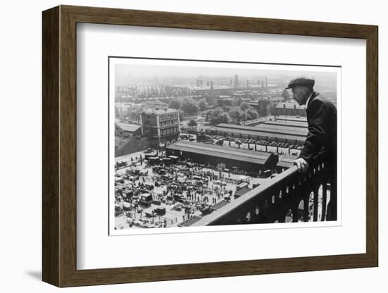 A Man Looks Down over the Old Caledonian Road Market, Caledonian Road, North London-null-Framed Photographic Print