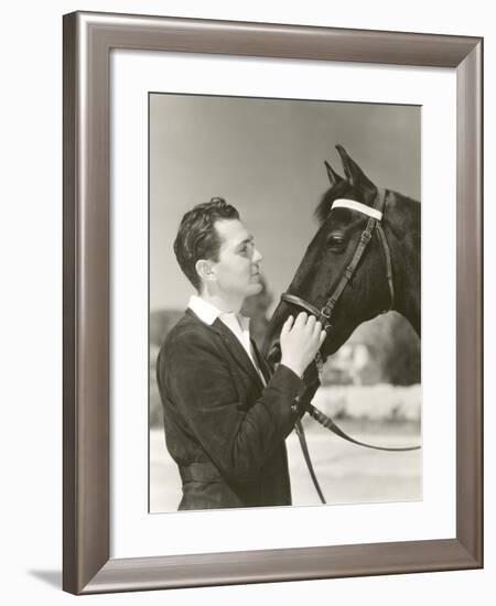 A Man Petting His Horse-null-Framed Photo