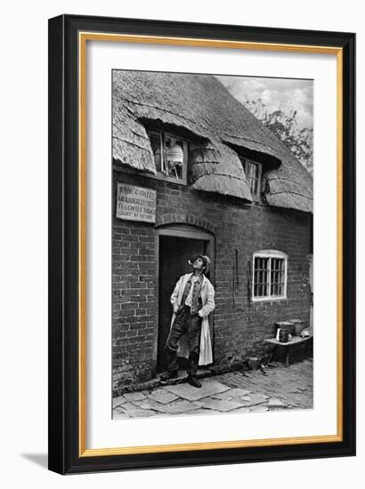 A Man Smoking a Pipe Outside a Shop, Worcestershire, C1922-AW Cutler-Framed Giclee Print