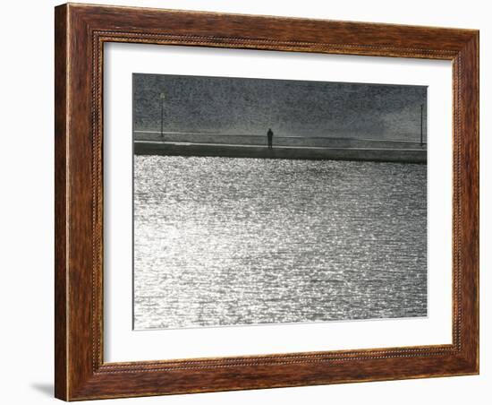 A Man Stands on the Banks of a Small Lake, Munich, on Friday, November 3, 2006.-Christof Stache-Framed Photographic Print