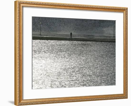 A Man Stands on the Banks of a Small Lake, Munich, on Friday, November 3, 2006.-Christof Stache-Framed Photographic Print