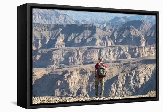 A Man Stands on the Edge of the Fish River Canyon, Namibia, Africa-Alex Treadway-Framed Premier Image Canvas