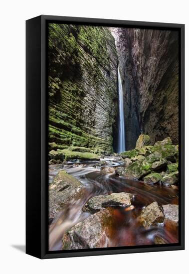 A Man Stands under Cachoeira Fumacinha Waterfall in Chapada Diamantina National Park-Alex Saberi-Framed Premier Image Canvas